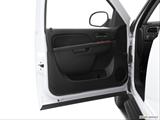  Inside of driver's side open door, window open photo
